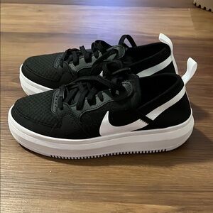 Nike Black and White Athletic Shoes with Mesh Upper